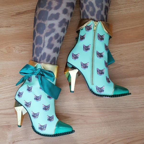 green cat print ankle boots with zip and jewel shaped gold heel