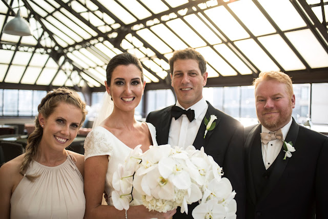 Formal photos on the rooftop.