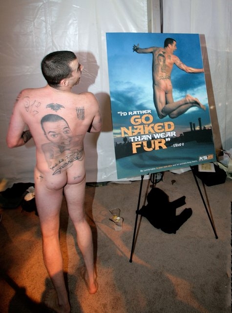 Actor Steve-O poses next to his Peta photograph during Mercedes Benz Fashio...