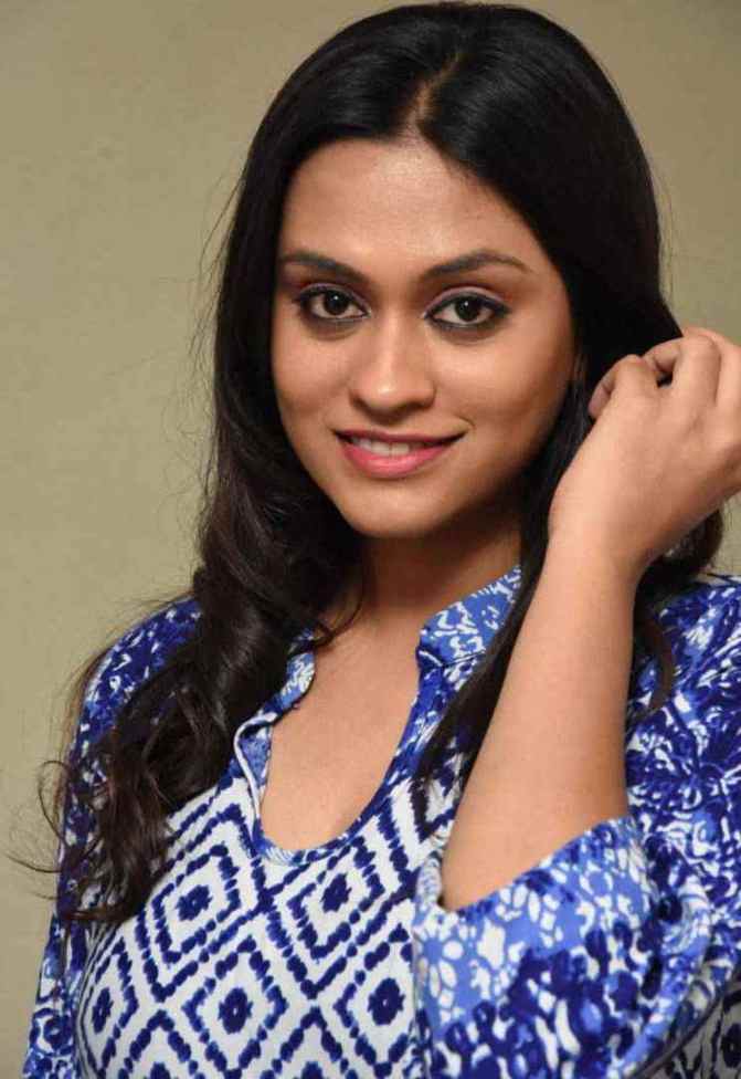 Telugu TV Anchor Geetha Bhagath Stills In Blue Dress