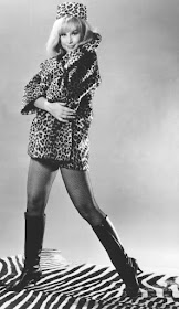 Barbara Eden in leopard skin coat and hat
