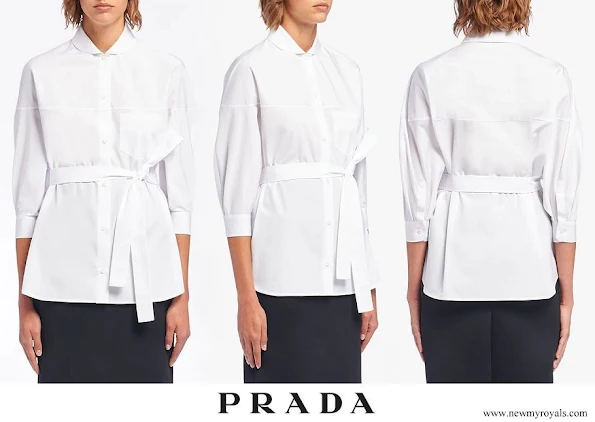 Princess Charlene wore a new white poplin tie-waist shirt from Prada