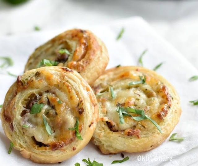 Puff Pastry Pinwheels With Prosciutto, Pesto, And Cheese