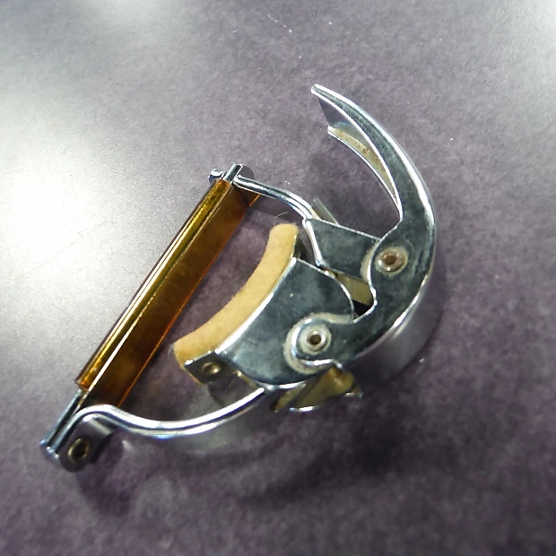 The Amateur Luthier A History Of The Inlaid Guitar Capo