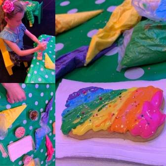 Disney Junior Party Girl decorating a cookie