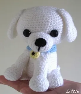 http://littleyarnfriends.com/post/28548679575/crochet-pattern-lil-kino-the-puppy