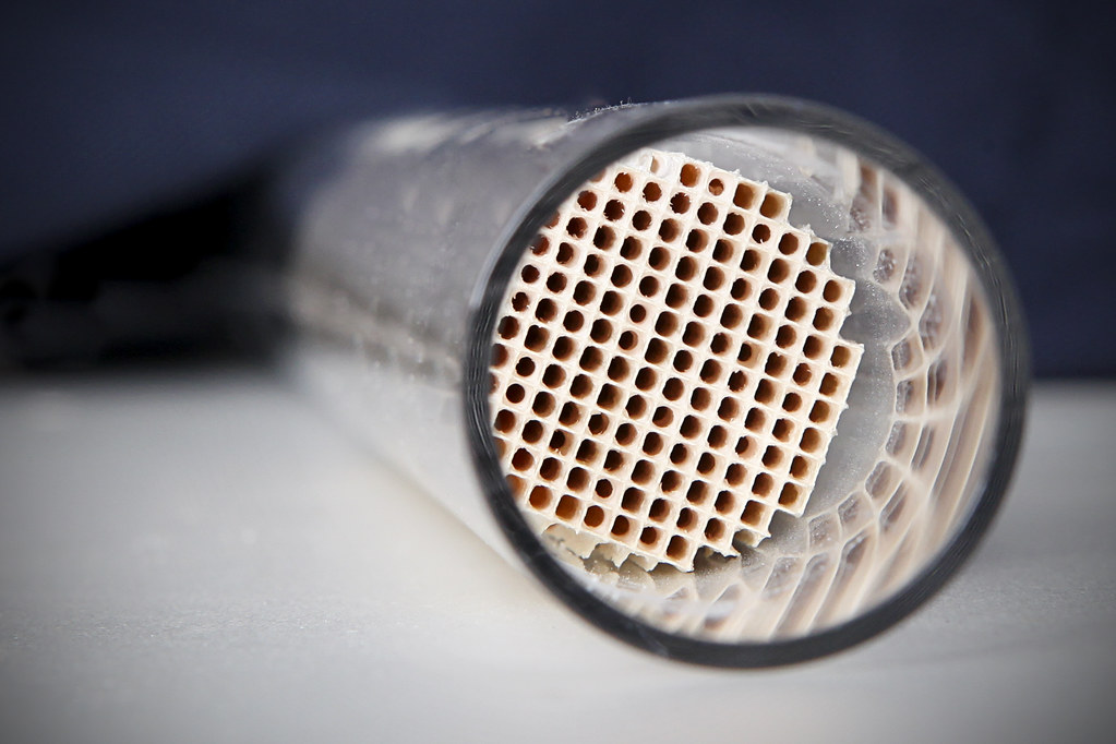 THE MECHANICAL SPOT WHAT IS FUNCTION OF CATALYTIC CONVERTER?