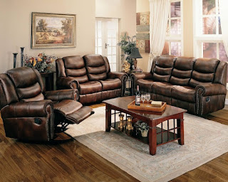 luxury living room with brown leather reclining sofa and wood coffe table on rug and framed leather living room chair full set black loveseats