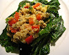 Millet-Quinoa Hash with Peppers and Zucchini on Sautéed Greens