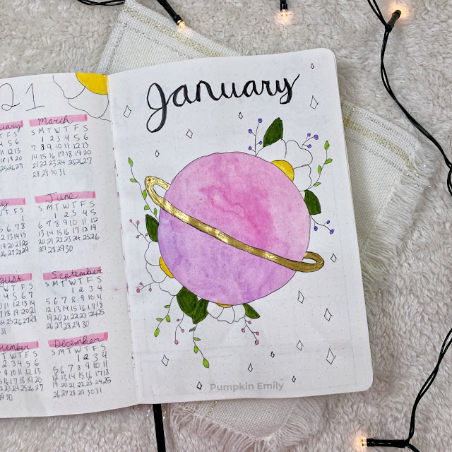 January bullet journal planet and flower cover page