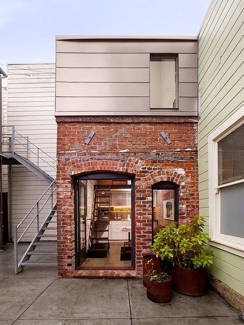 06-Brick-House-Front-View-Christi-Azevedo-Brick-House-Micro-Architecture-Laundry-Boiler-Room-www-designstack-co