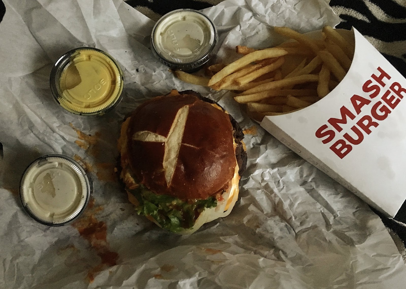 Enjoying a veggie burger from Smashburger