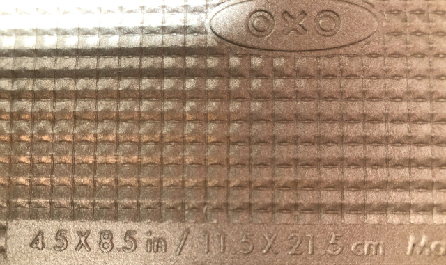 Extreme close-up of micro-textured surface on the bottom of the pan