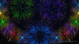 Attractive Colorful Fireworks Explosion On Dark Starry Night Sky