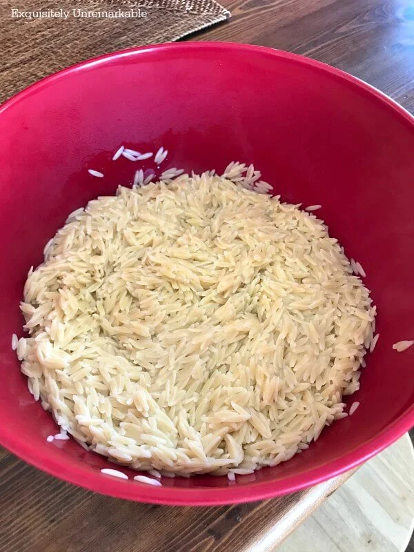 Cooked Orzo In A  Red Bowl