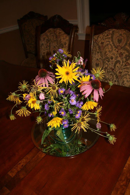 Purple / yellow garden flower arrangement
