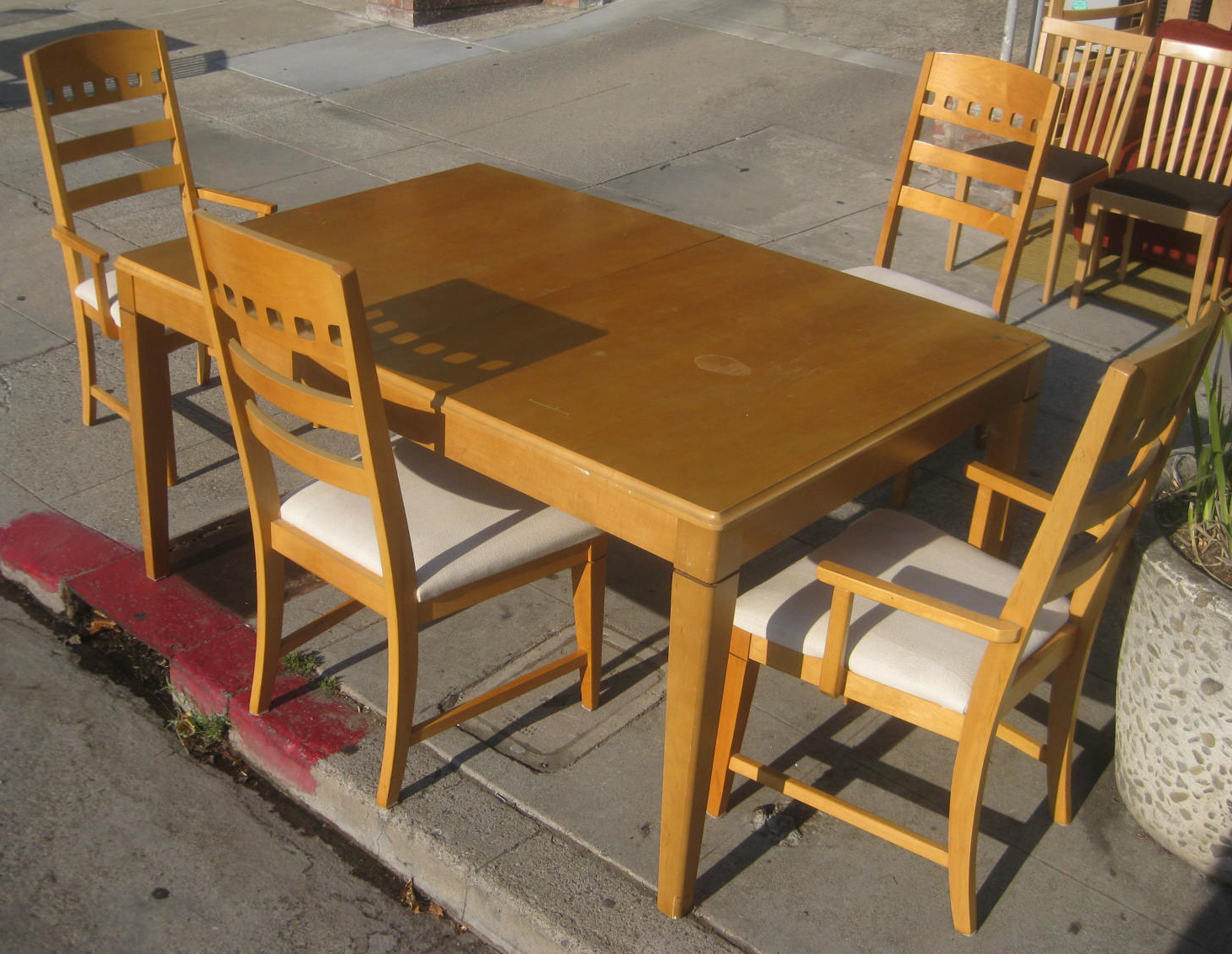 UHURU FURNITURE & COLLECTIBLES SOLD Table and 4 Chairs 100