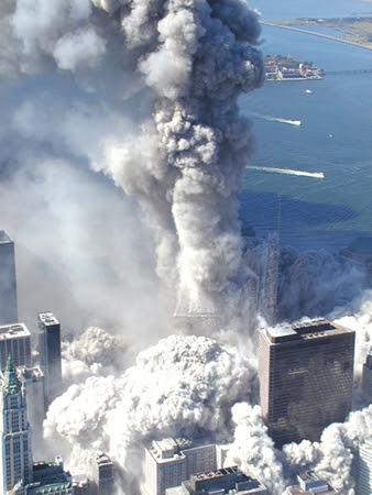 as the towers collapsed upward in a