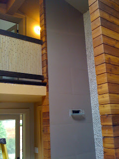 Finished construction photo of two story shower by Studio Santalla