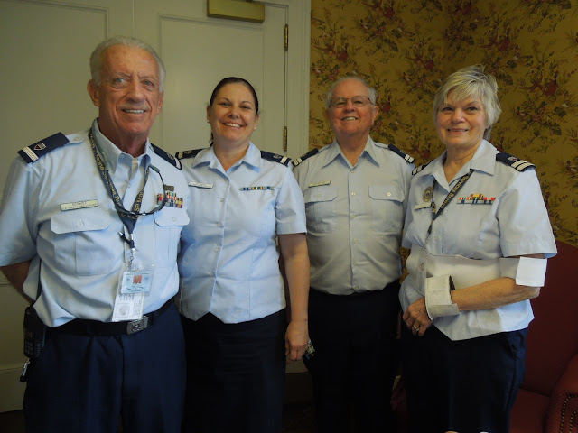 A group of Auxilarists gather after the boating safety class.