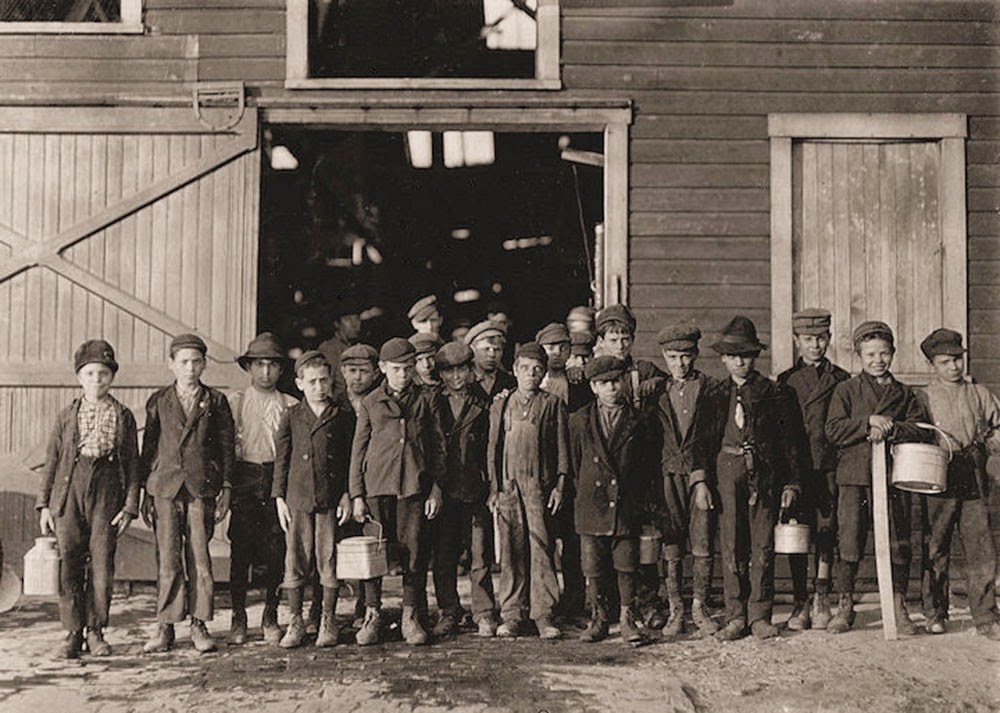 Group Portraits: At 5 p.m., boys going home from Monougal Glass Works. One boy remarked, 