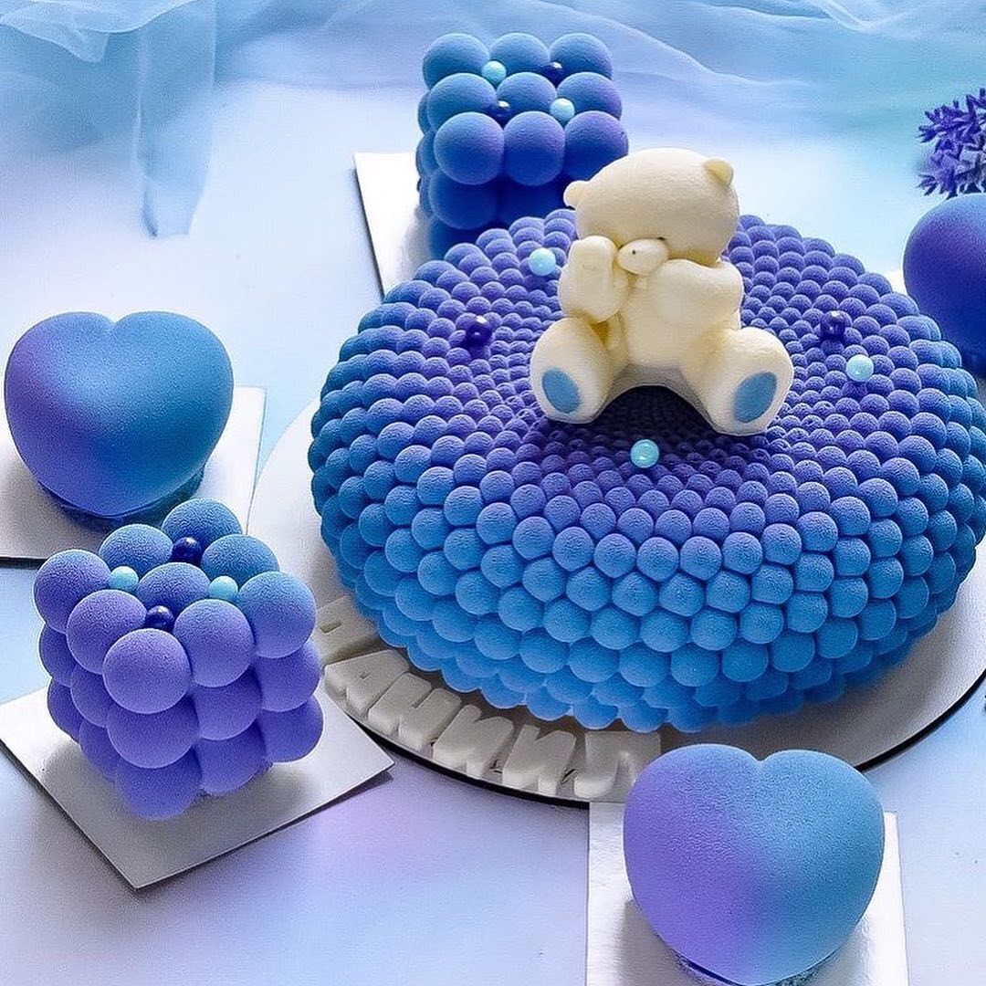 10 rainbow handmade mousse dessert cakes. Melody Jacob