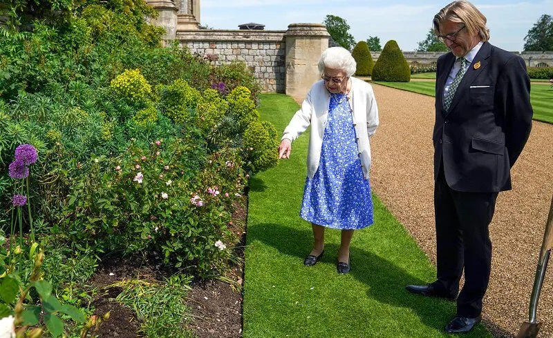 Queen Elizabeth has received a commemorative rose to mark what would have been the 100th birthday of the Duke of Edinburgh