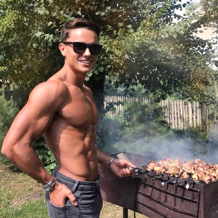 cute-fit-young-college-dude-shirtless-sunglasses-meat-grilling