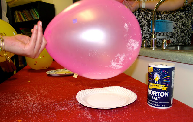 lab with salt and statically charged balloon Balloon static electricity and salt