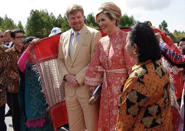 Queen Maxima wore Zimmermann Veneto border paisley print linen dress. Maxima visited a traditional Batak village and Del Institute