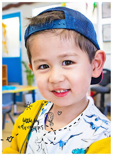 Boy at Kinder wearing a cap