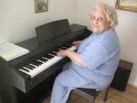 Senior Citizen playing digital piano