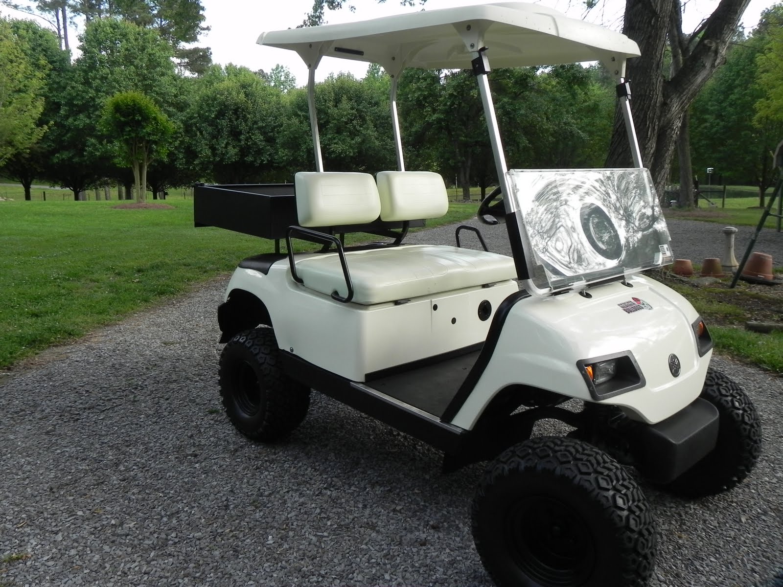 LIFES LITTLE GARDEN Golfing Or Hunting?