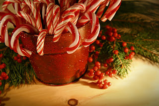 candy canes in a jar, christmas decorations with a history of the candy cane and how a candy cane tradition got started