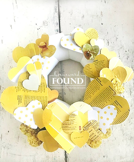 art,wall art,DIY,diy decorating,paper crafts,paper,vintage paper,Valentine's Day,re-purposing,up-cycling,trash to treasure,wreaths,winter,color,color palettes,colorful home,Pantone color of the year,Illuminating Yellow,Ultimate Gray,Pantone 2021,yellow and gray,hearts, heart decor,decorating with hearts,Valentine's Day decor,Valentine hearts,heart wreath,paper hearts, Disney decor, Disneyland tickets