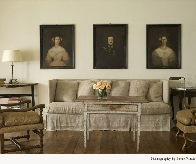 Beautiful French country interior design in a living room with Belgian linen slipcovered sofa by Pamela Pierce Designs.