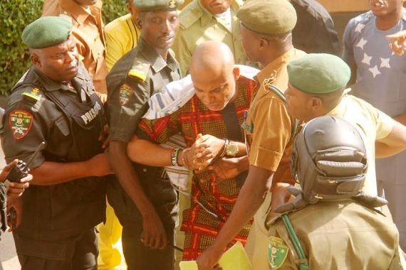 d Photos of IPOB leader, Nnamdi Kanu struggling with Prison warders
