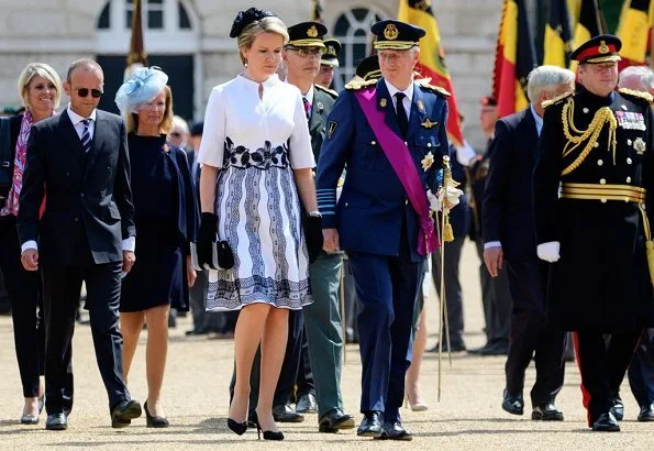 King Philippe and Queen Mathilde met with Queen Elizabeth II at Windsor Castle.Belgian Remembrance Parade. Queen wore Natan dress