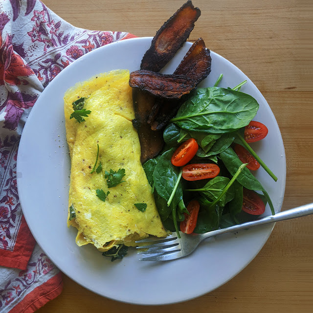 Collard greens and cheddar omelette