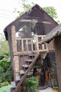 nipa hut with two floors