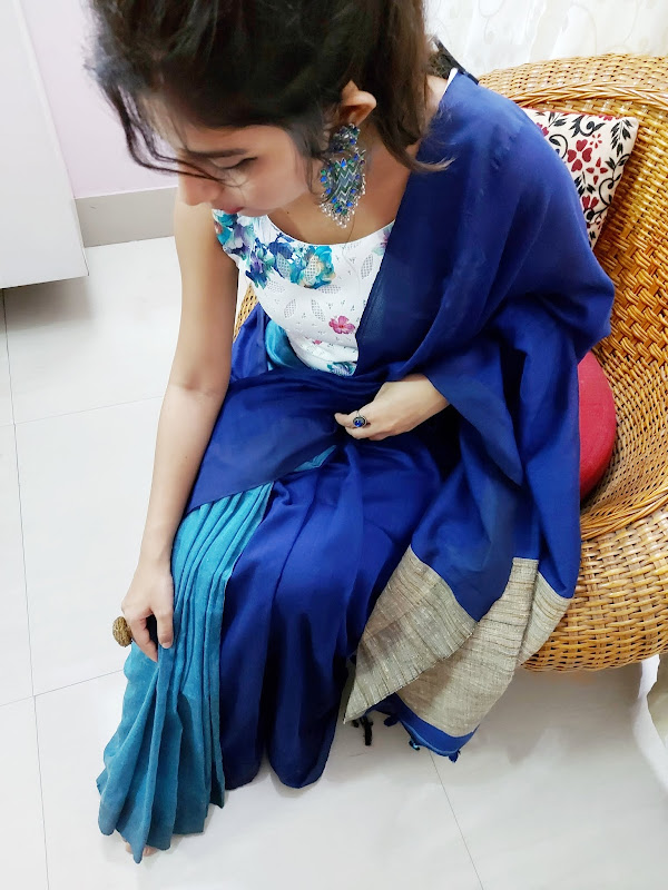 Ritu Biswas wearing a blue saree with crop top in her fashion and lifestyle blog. Ritu Biswas wearing a blue saree with crop top in her fashion and lifestyle blog.