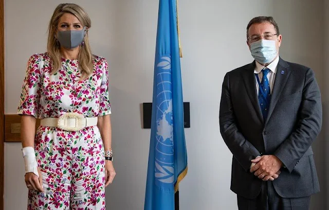 Queen Maxima wore a truman floral-print silk-satin wide-leg jumpsuit from Seren. Oscar de la Renta embellished belt