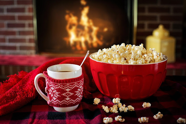 warm and cozy popcorn and coffee