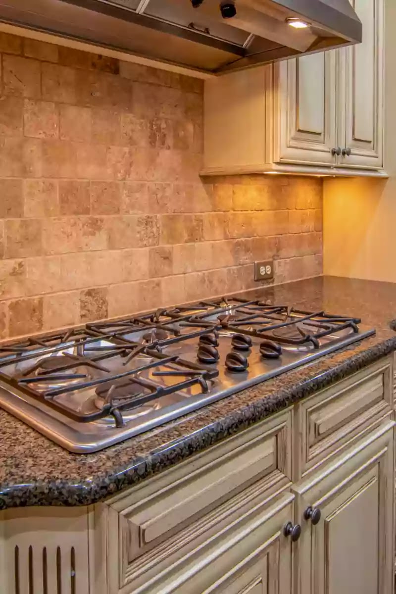 How to remove scratches from gas stove top?