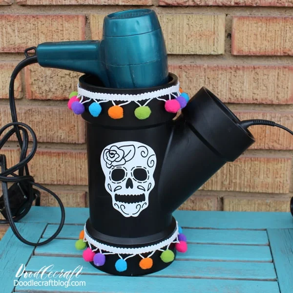 Like this fun hair tool caddy decorated with a vinyl sugar skull:
