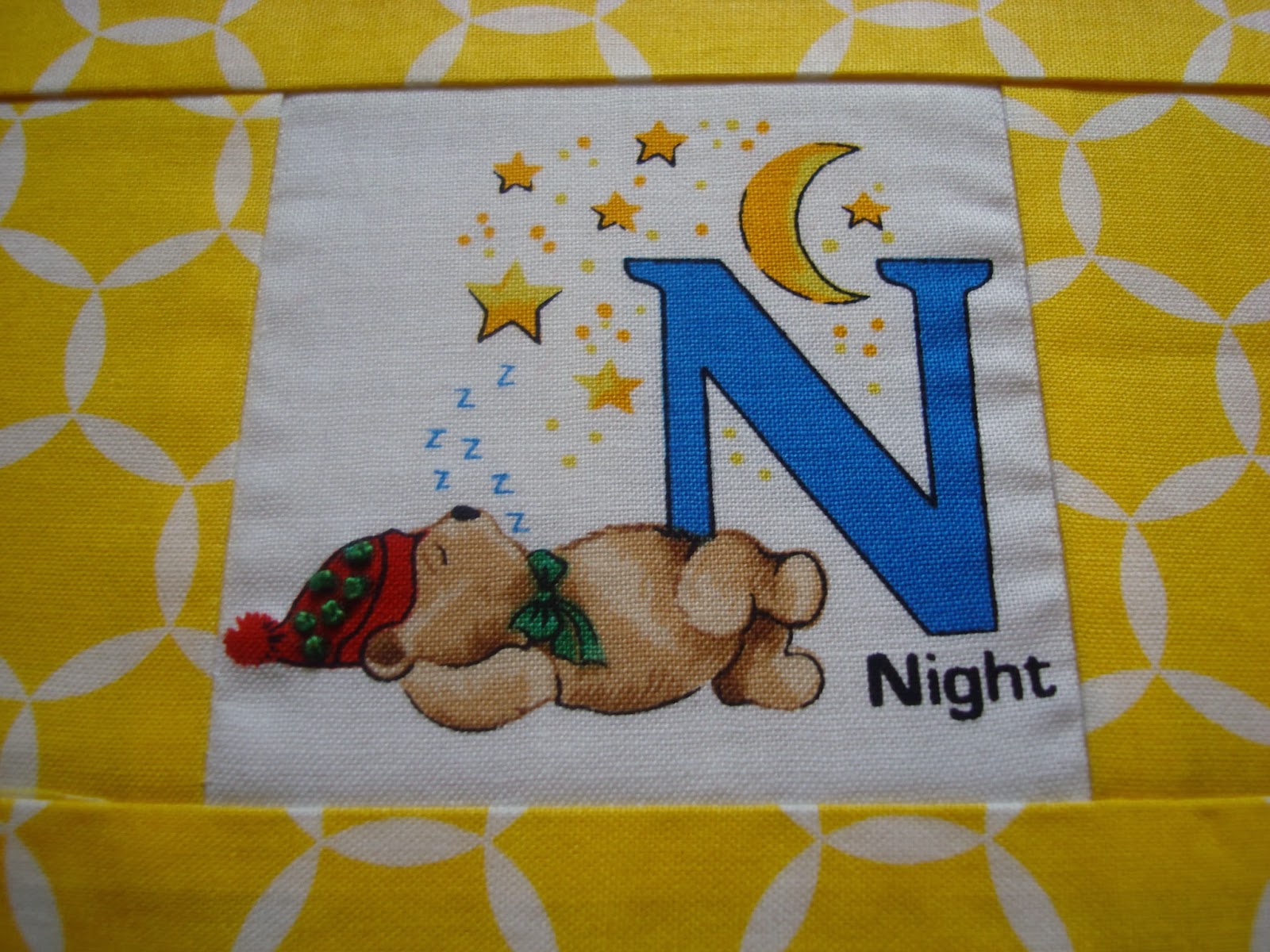 Alphabet embroidered quilt / CHARM ABOUT YOU