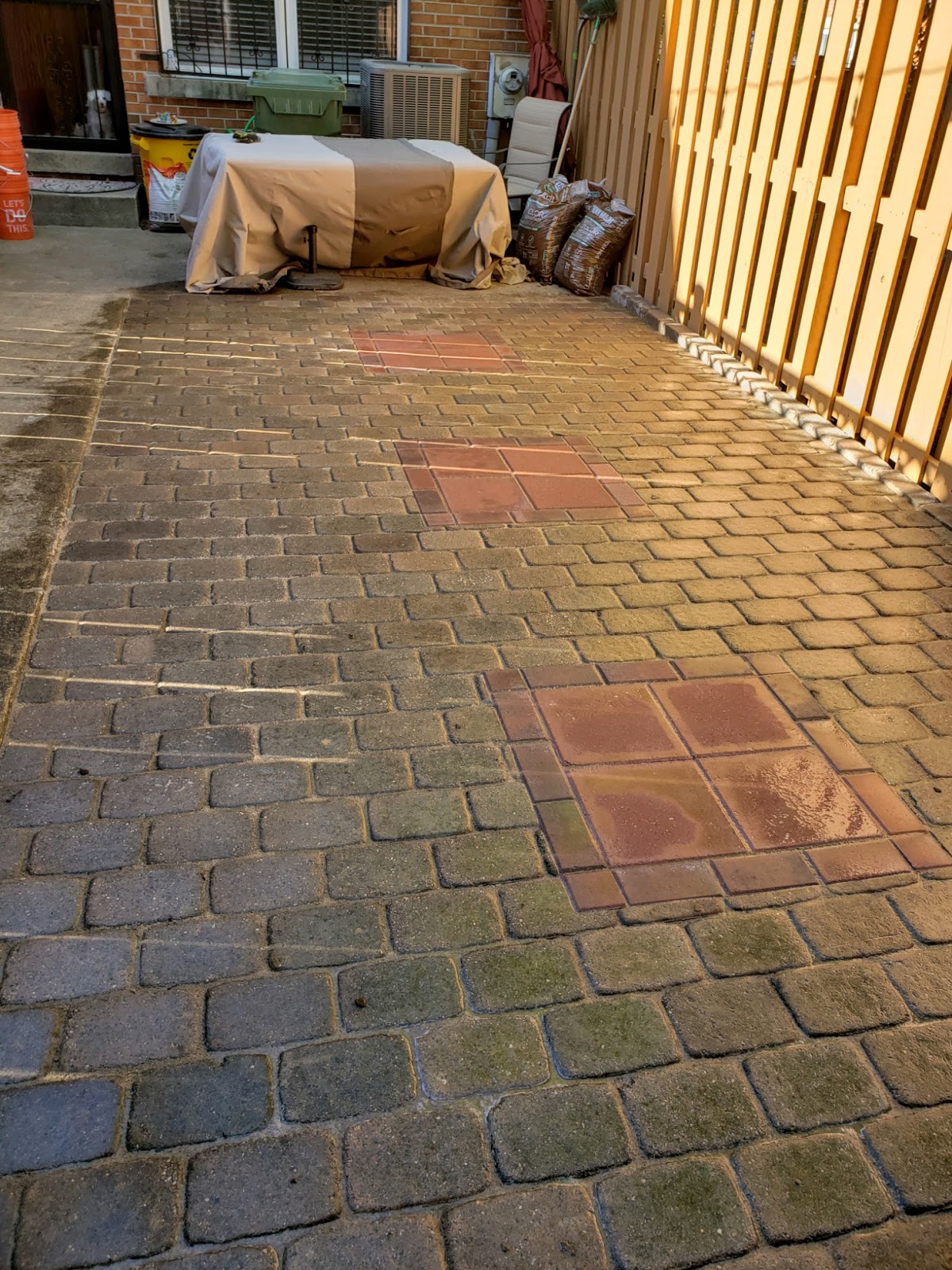 Custom Stoneworks & Design Inc. Used old pavers and rebuilt patio in