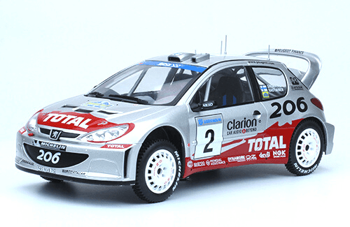 LES PLUS GRANDES VOITURES DE RALLYE 1/18 Peugeot 206 WRC (2002) M. Grönholm