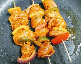 Cooking chicken Kebab on Tawa or pan for chicken kebab recipe without oven
