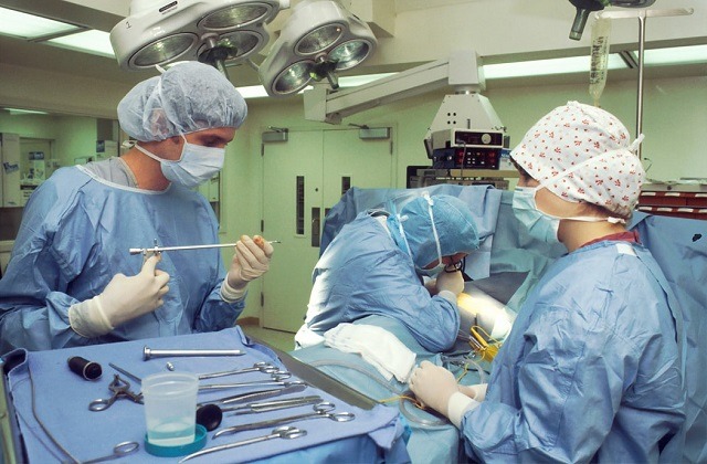 surgeons in scrub suit in operating room